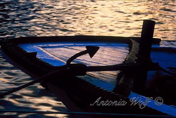 Blue Fishingboat Catching the Last Light